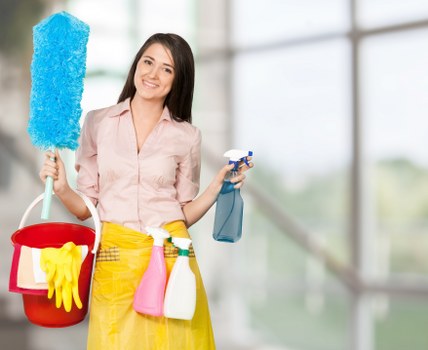 Local floor cleaning specialist treating a busy hallway floor