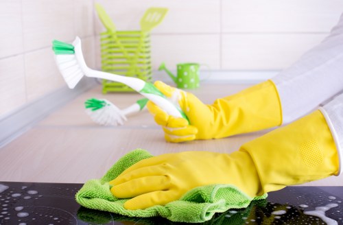 Cleaning treatment being applied to a carpeted floor area